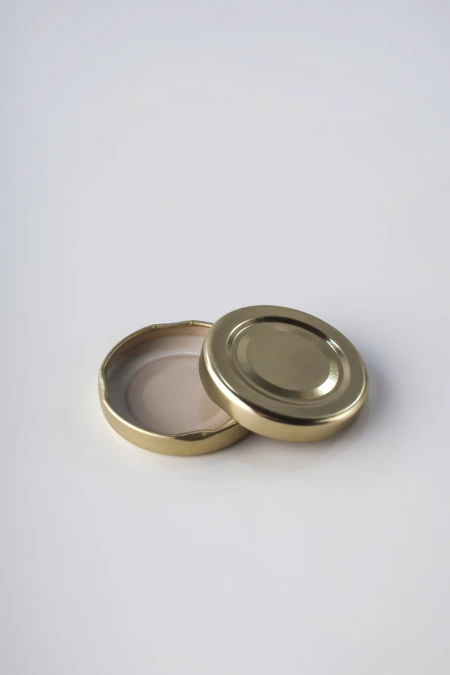 [11003] TAPA AXIAL 63 MM DORADA