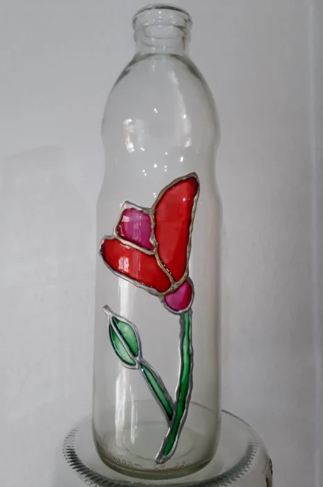 Botellas de agua pintada flor roja